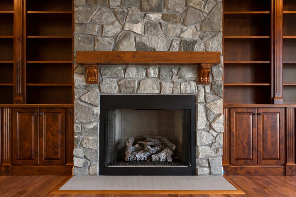 Elegant,Stone,Fireplace,With,Wooden,Bookshelves,Design